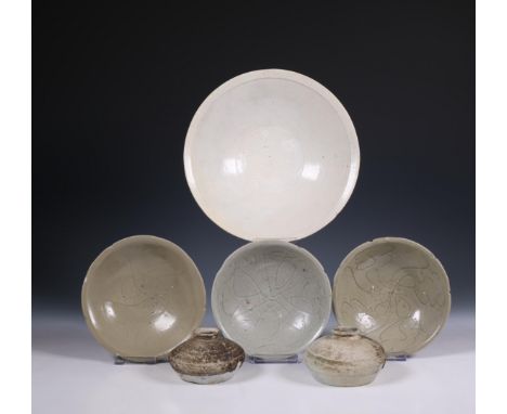 China, a collection of celadon-glazed bowls, vases and a dish, Song dynasty, 10th-12th century, comprising three bowls with i