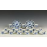 China, a set of twenty Transitional 'Hatcher Cargo' blue and white porcelain wine-cups and a pair of