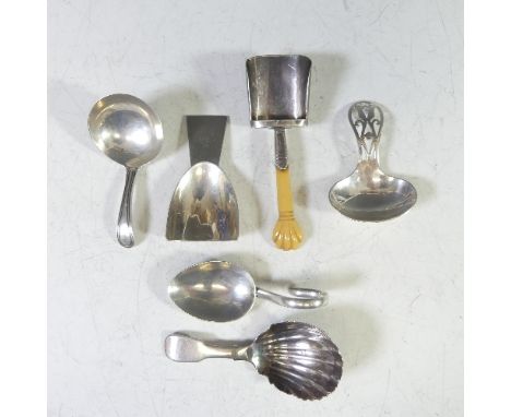 A George III silver Caddy Spoon, by William Eley &amp; William Fearn, hallmarked London, 1799, with plain circular bowl and r