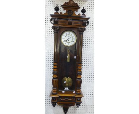 An early 20th century walnut Vienna regulator style wall Clock, the 8-day single weight movement with brass bob pendulum, 138