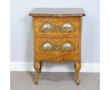 A French Louis XVI Commode, comprising two drawers, each with gilt mounts and porcelain plaques, W 55cm x D 43cm x H 76cm. 