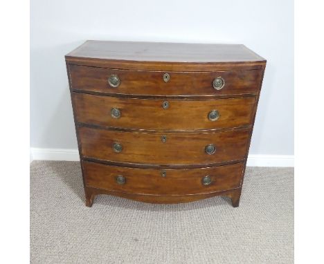 A Georgian mahogany Bowfront Chest of Drawers, split to top, W 107cm x D 56cm x H 103cm. 