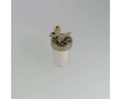 Stuart Devlin; A miniature silver Pot,&nbsp;hallmarked London, 1979, of plain cylindrical form, the lift off gilt textured li