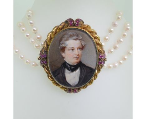 A 19thC oval Portrait Miniature of a Gentleman, on ivory, in a foliate engraved ropetwist mount set rubies, unmarked but test