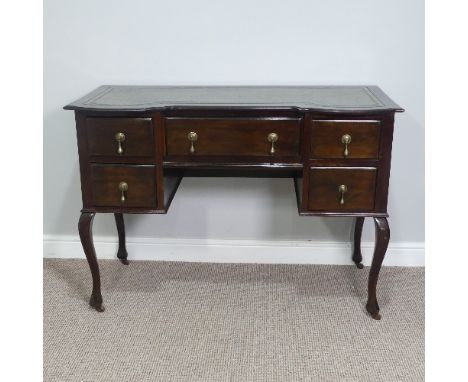 An early 20thC Writing Desk,&nbsp;the rectangular top having inset writing skiver, above five drawers, all raised on cabriole