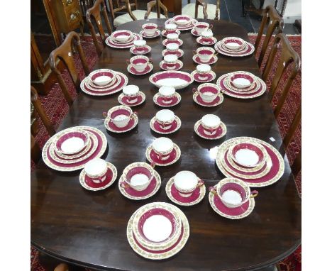 A Wedgwood 'Whitehall' pattern part Tea and Dinner Service, comprising fourteen Cups and Saucers, seven Dinner Plates, eight 