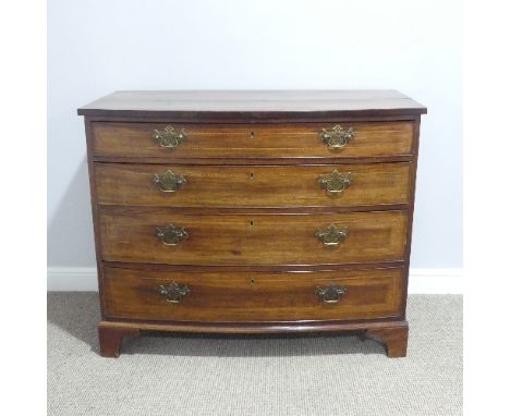 A Georgian mahogany bow front Chest of Drawers, split to top and side, W 112cm x D 56cm x H 89cm.
