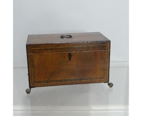 A George III mahogany Tea Caddy,&nbsp;of rectangular form, with hinged lid opening to reveal two metal lined compartments, on
