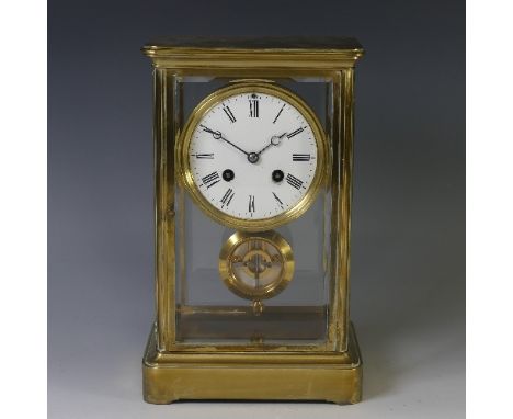 A 19th century French brass four-glass Mantel Clock, the movement stamped “B.R.”, striking on a bell, the white dial with bla