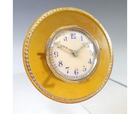 A pretty early 20thC French silver and gold mounted dressing table Clock, in the manner of Cartier, of circular form with sil