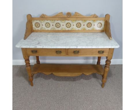 A Victorian marble topped pine Washstand, with tiled gallery back above a rectangular white marble top, on a pine base with t