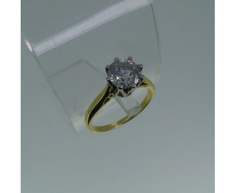 A diamond solitaire Ring, the brilliant cut stone approx 1.12ct, eight claw set in white gold, on an 18ct yellow gold shank, 