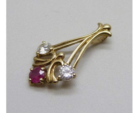 A 9ct gold, ruby and white stone pendant, 1g, 21mm