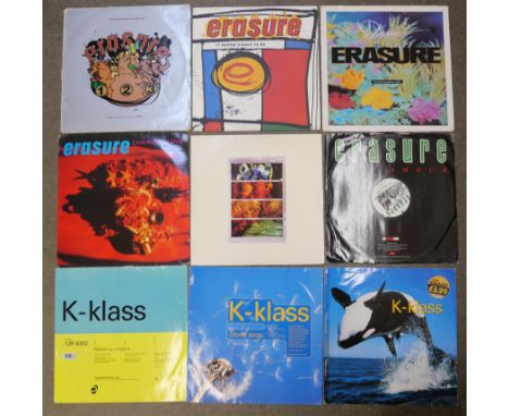 A collection of LP records including UB40, The Beatles, Bob Dylan with case