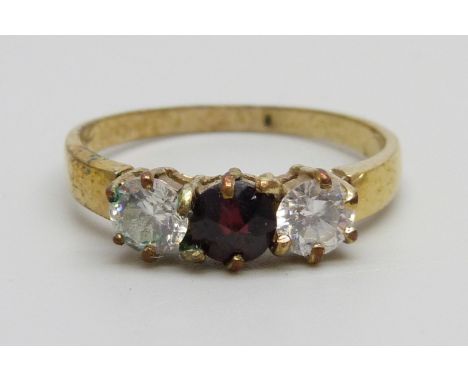 A silver gilt, garnet and zircon ring, R