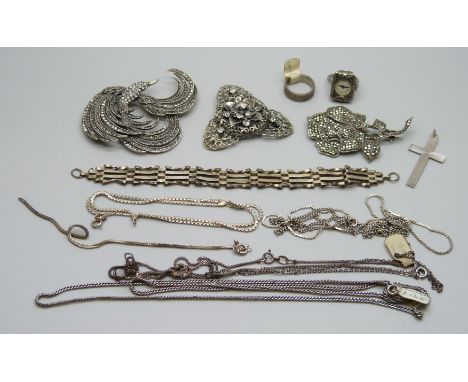 A silver and marcasite ring watch, an 800 silver ring, a silver and marcasite rose brooch, chains, etc., (gate bracelet requi