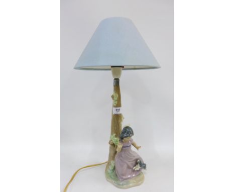 Nao figural table lamp base and shade, size excluding fitting is approx 30cm 