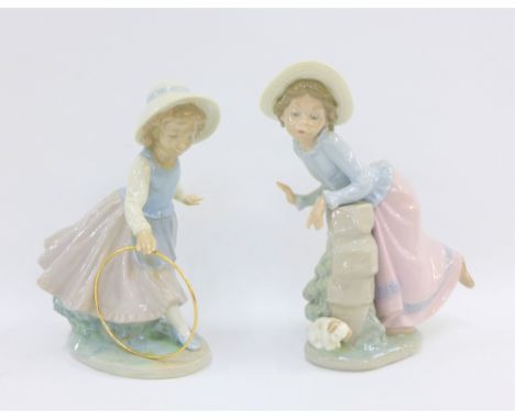 Two Nao porcelain female figures to include one with a hula hoop, with printed backstamps, tallest 20cm (2) 