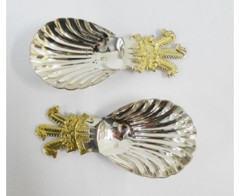 A pair of silver 'Prince of Wales Feathers' silver caddy spoons, Roberts &amp; Belk, Sheffield 1981, 9cm long (2) 