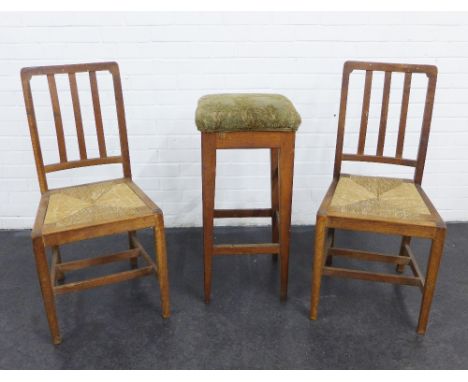 Pair of 20th century oak side chairs with rush seats together with a vintage stool with upholstered seat (3) 