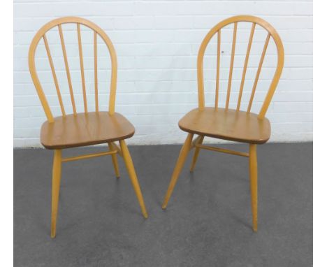 Pair of Ercol light elm Windsor style chairs with spindle backs, blue labels (2) 