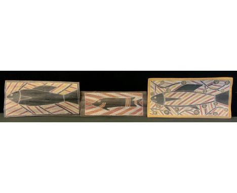Tribal Art - three mid 20th century Aboriginal bark paintings, stylised fish, largest 50cm x 24.5cm, (3) 