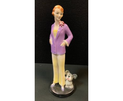 An Art Deco Goebel figure, of a young lady and a dog, 24cm high, impressed monogram, model no. FF10, c.1935 - 1949 