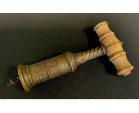A 19th century brass patent corkscrew, bone handle, 17cm long 