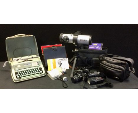 A Praktica  BC-1 Electronic SLR 35mm camera body, 70-210mm and 70mm lens,  cine camera,  portable Hermes typewriter etc 