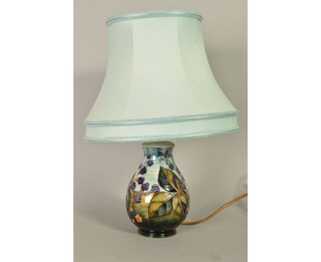 A MOORCROFT POTTERY TABLE LAMP AND SHADE, 'Blackberry' pattern, impressed marks to base, height not including fitting 20cm