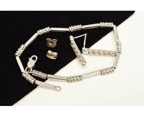 A 9CT WHITE GOLD CUBIC ZIRCONIA BRACELET AND DROP EARRINGS, the bracelet designed as a line of bars interspaced by panels of 