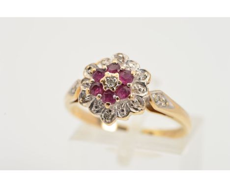 A 9CT GOLD, RUBY AND AND DIAMOND CLUSTER RING, designed as a central single cut diamond within a circular ruby surround and a