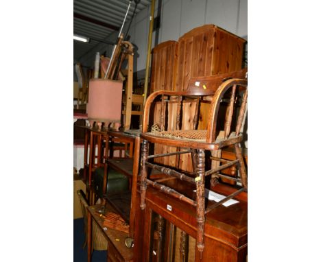 A 1960'S TEAK DESK, with three drawers, oak trolley, oak clothes rail, brass standard lamp, oak smokers chair (sd) Lloyd Loom