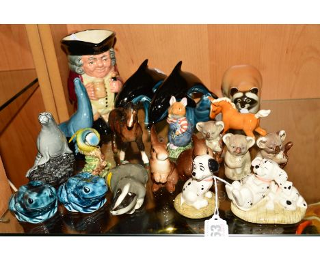 A GROUP OF ORNAMENTS, to include Royal Doulton Disneys 101 Dalmations 'Lucky' DM8 and 'Penny and Freckles' DM3, 'Wilfred Toad