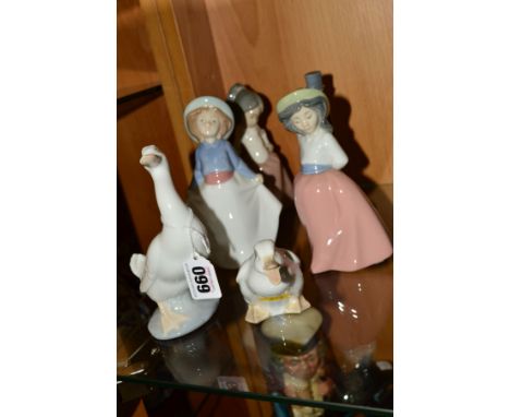 SIX NAO AND LLADRO FIGURES, to include Lladro Duck, Nao Duck, girl holding her skirt No1290, girl on placid walk No1291, a br