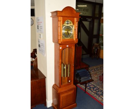 A REPRODUCTION GOLDEN OAK LONGCASE CLOCK, tempus fugit movement, brass and silvered dial with Roman numerals, height 194cm (t