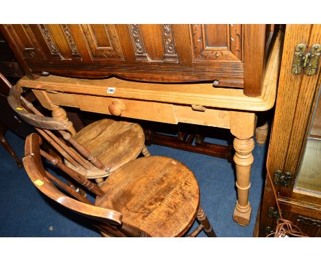 A VICTORIAN PINE KITCHEN TABLE with a single drawer, width 110cm x depth 74cm x height 80.5cm, and two circular seated stick 