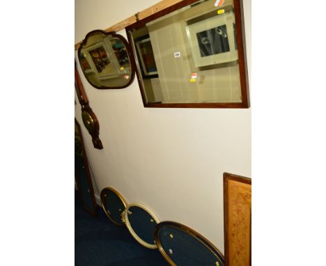 A GEORGIAN MAHOGANY BEVELLED EDGE WALL MIRROR, another mahogany wall mirror, a rectangular wall mirror and three various othe
