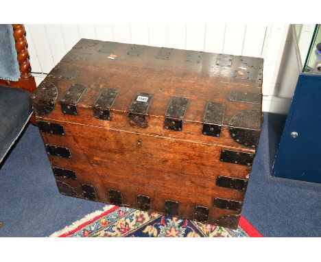 A 19TH CENTURY OAK AND METAL BANDED TRUNK, width 70cm x depth 41cm x height 49.5cm
