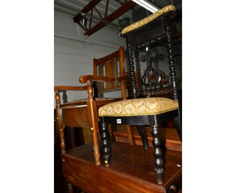 A VICTORIAN EBONISED PRAYER CHAIR together with an oak commode chair (2)