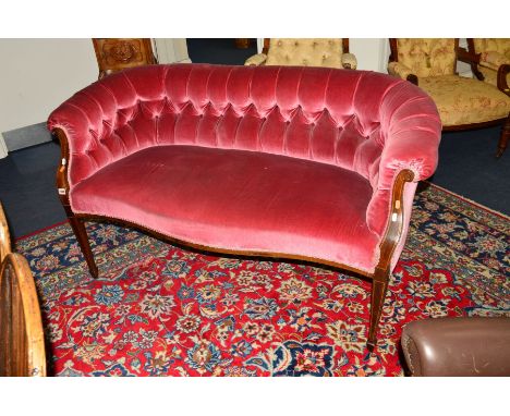 AN  EDWARDIAN MAHOGANY AND INLAID PINK UPHOLSTERED TWO SEATER SOFA