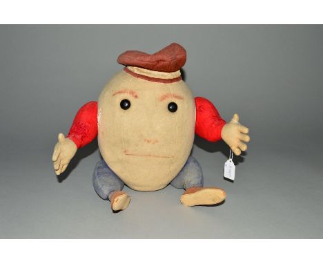A VINTAGE HUMPTY DUMPTY SOFT TOY, multicoloured felt construction, plastic button eyes, painted features (faded), jointed arm