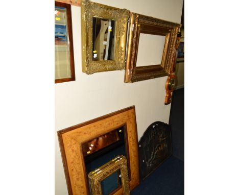 A 19TH CENTURY GILT WOOD WALL MIRROR, together with two 19th century foliate gilt wood picture frames and another wall mirror