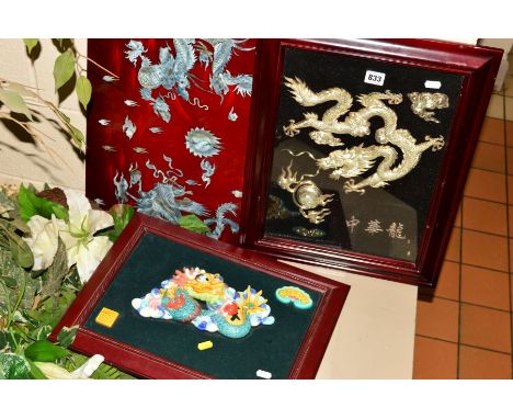 THREE CHINESE DRAGON PICTURES, the first is a colourful ceramic dragon holding a pearl, mounted on board, framed, approximate