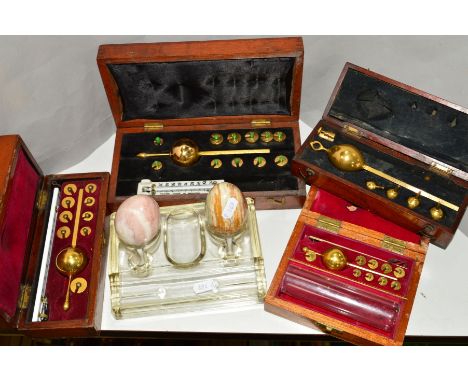FOUR CASED HYDROMETER SETS, Peter Stevenson Ltd, two Sikes and a Lotus, London, together with two marble eggs and a glass ink