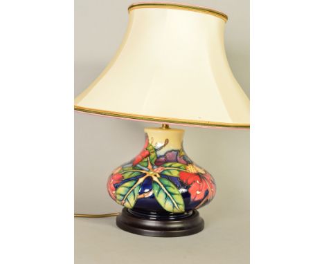 A MOORCROFT POTTERY TABLE LAMP AND SHADE, Simeon pattern, on wooden base, height not including fitting 18cm
