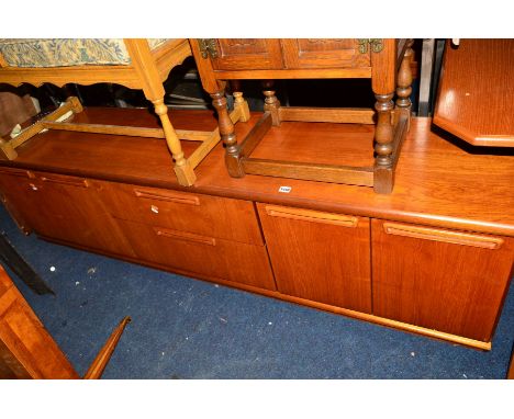 A LOW NATHAN 1960'S TEAK SIDEBOARD with two central drawers, width 201cm x depth 45cm x height 55.5cm