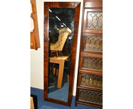 A REPRODUCTION MAHOGANY FLOOR STANDING MIRROR with a hinged A stand 