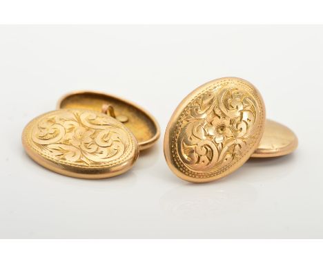 A PAIR OF EARLY 20TH CENTURY 9CT GOLD CUFFLINKS, each designed as two oval panels joined with chain link connectors, the fron