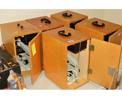 FIVE CASED BIOLAM MICROSCOPES, with accessories, one lacks lamp (5)